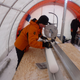 Lead study author Liz Thomas taking a measurement of an ice core.